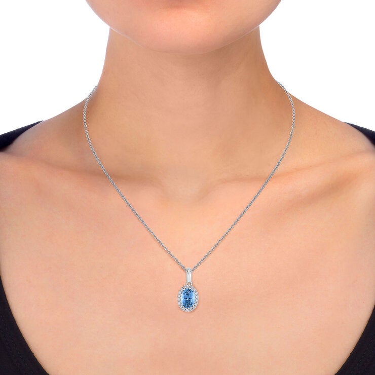 Oval Cut Aquamarine & 0.09ctw Diamond Necklace 14ct White Gold